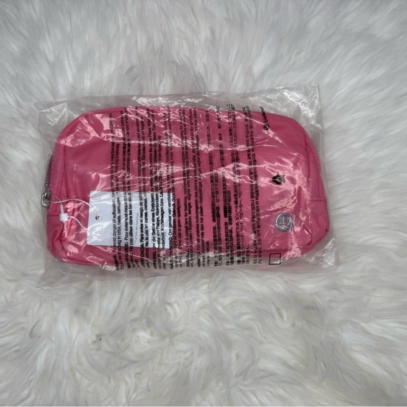 lululemon athletica Handbags - NWT Lululemon Everywhere Belt Bag 1L Salmon Pink